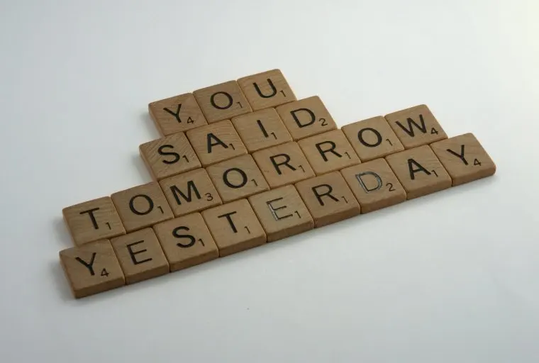 scrabble, scrabble pieces, lettering, letters, wood, scrabble tiles, white background, words, quote, letters, type, typography, design, layout, you said tomorrow yesterday, just do it, carpe diem, yolo, procrastination, live life, discipline, exercise, don't put it off, inertia, if not now when, don't delay, work hard, stop putting things off,